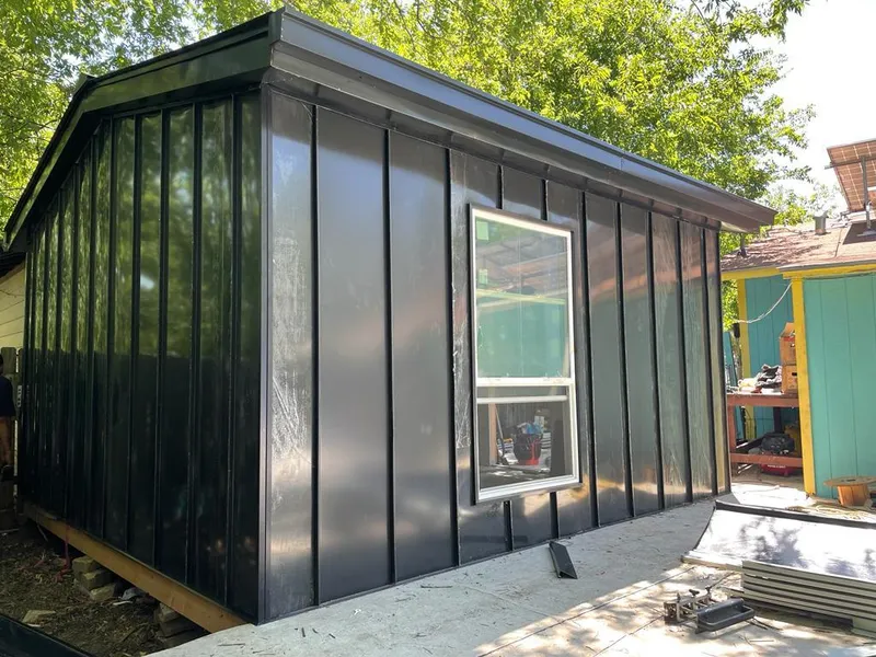 Black standing seam metal wall panels for Roof Inspection in Greenfield