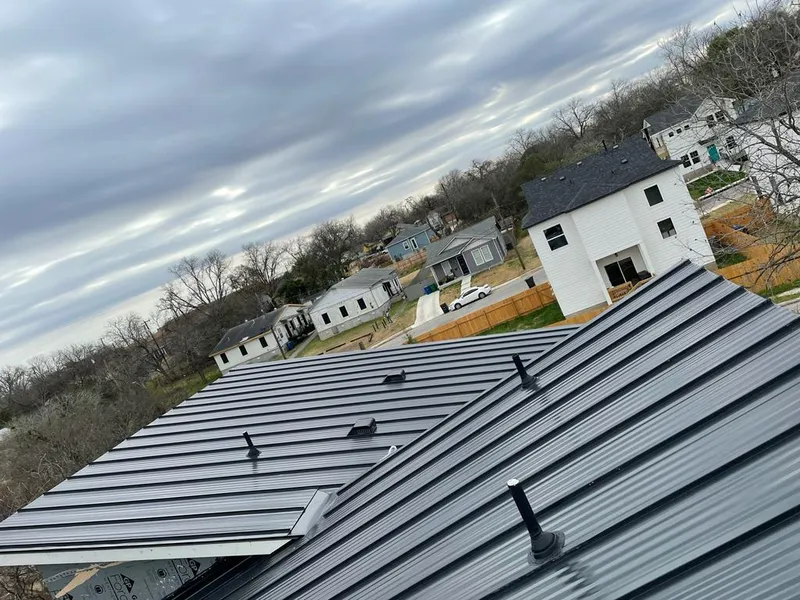 Standing seam metal roof panels with vents for Skylight Repair in Greenfield